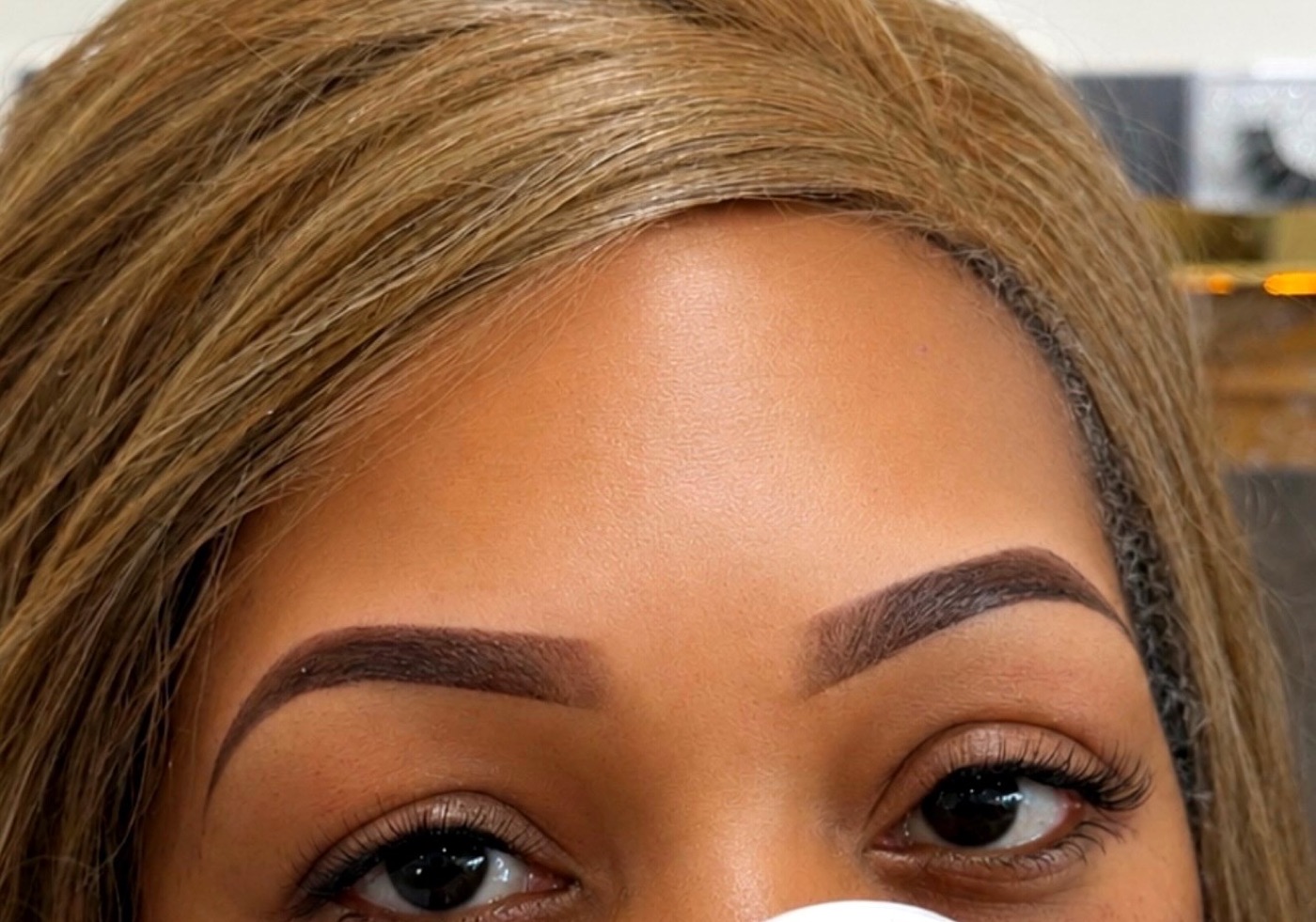 Shaped and tinted brows with lash extensions