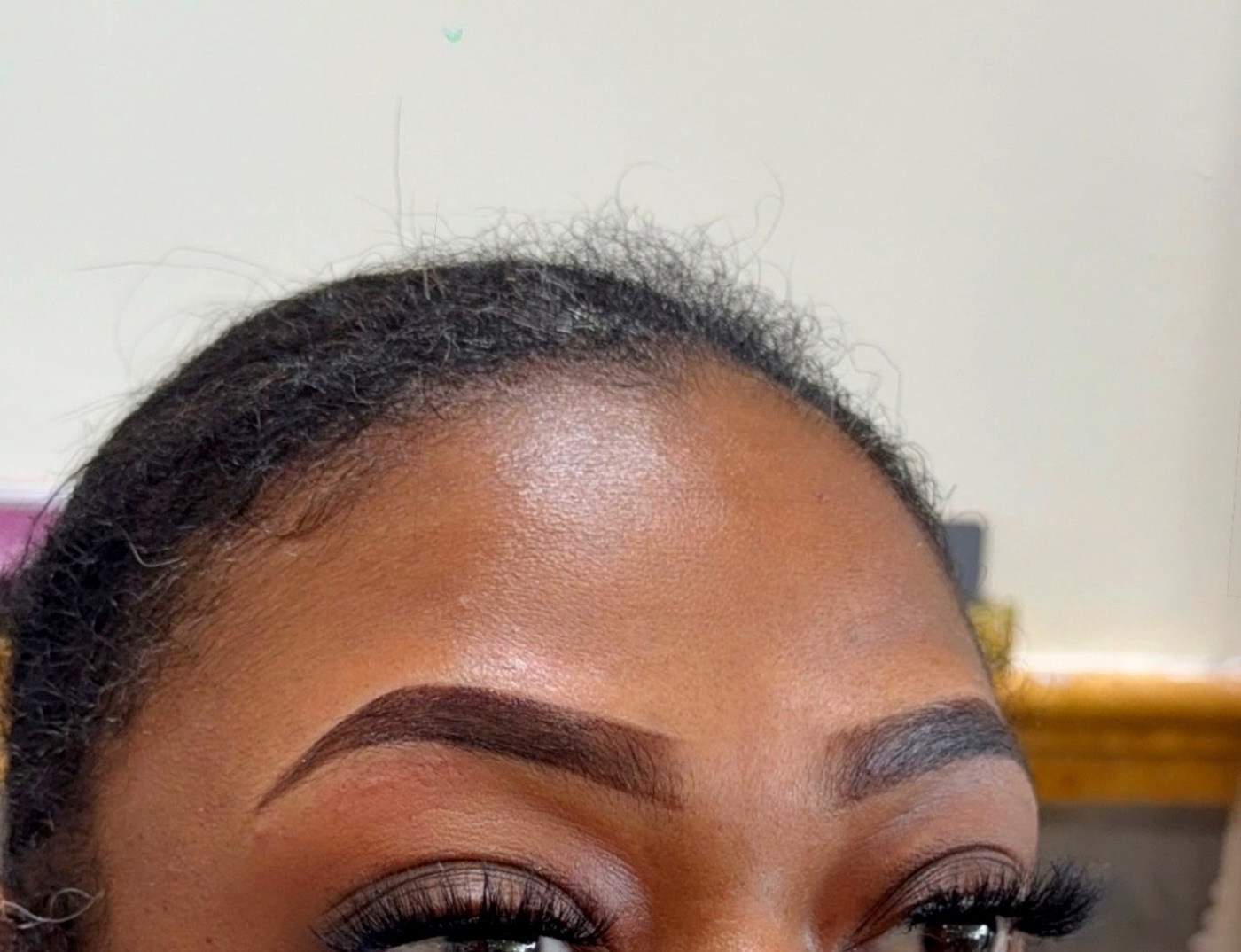 A clean brow arch with full lash extensions