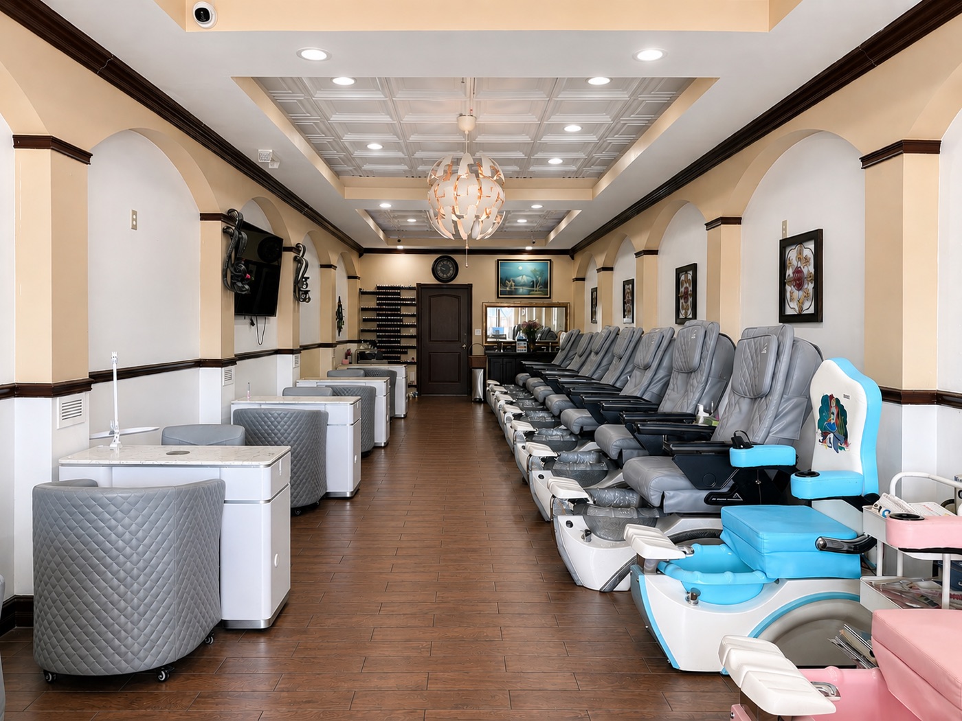 Manicure stations, pedicure chairs and the color wall